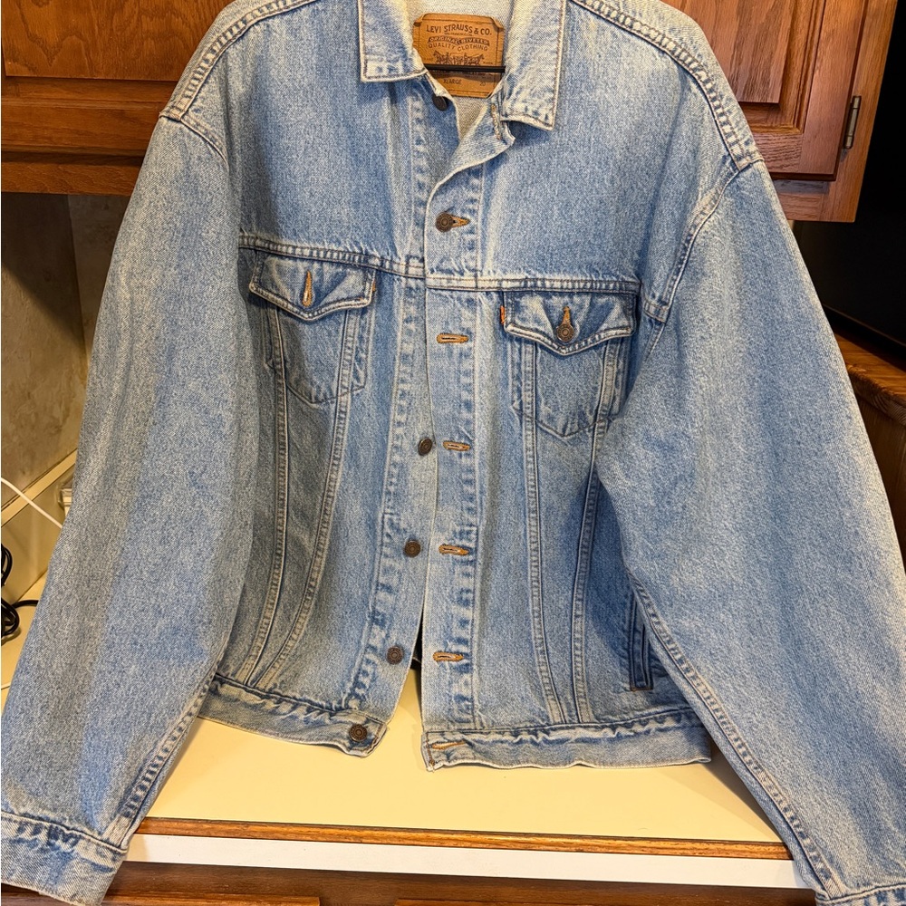 Vintage Levi's Blue Denim Jacket with Harley Davidson logo on back
